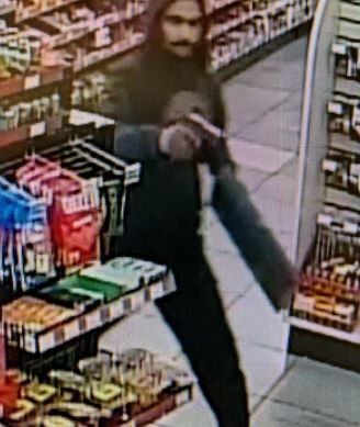 Suspect with .45 caliber handgun
